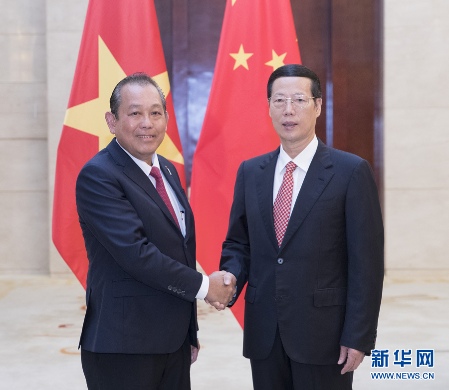  9月11日，中共中央政治局常委、國(guó)務(wù)院副總理張高麗在廣西南寧會(huì)見前來出席第十四屆中國(guó)－東盟博覽會(huì)和中國(guó)－東盟商務(wù)與投資峰會(huì)的越南常務(wù)副總理張和平。新華社記者王曄攝