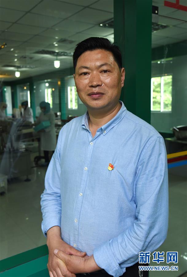 (最美基層干部·圖文互動(dòng))(1)“牛支書”丁琪的“牛路子”