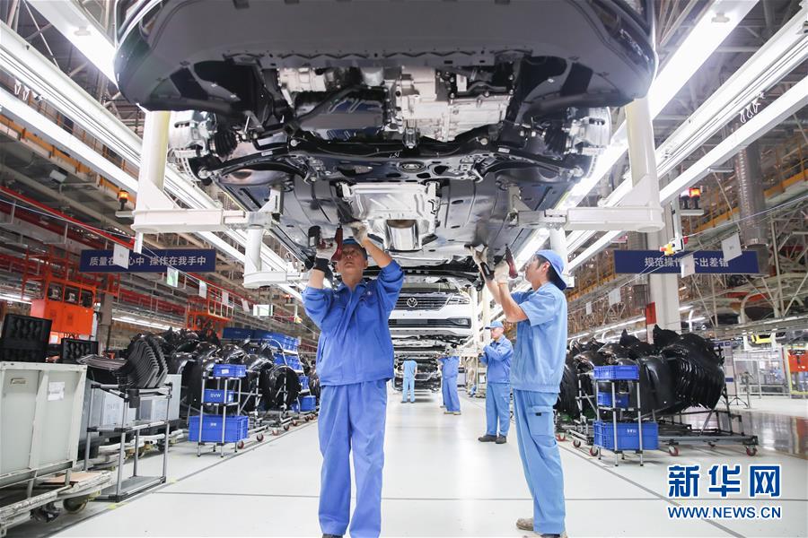 (百城百縣百企調(diào)研行·圖文互動)(2)上海汽車集團走出“中國紅”道路