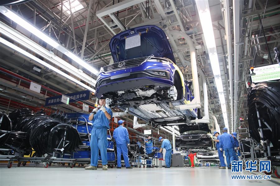 (百城百縣百企調(diào)研行·圖文互動)(3)上海汽車集團走出“中國紅”道路