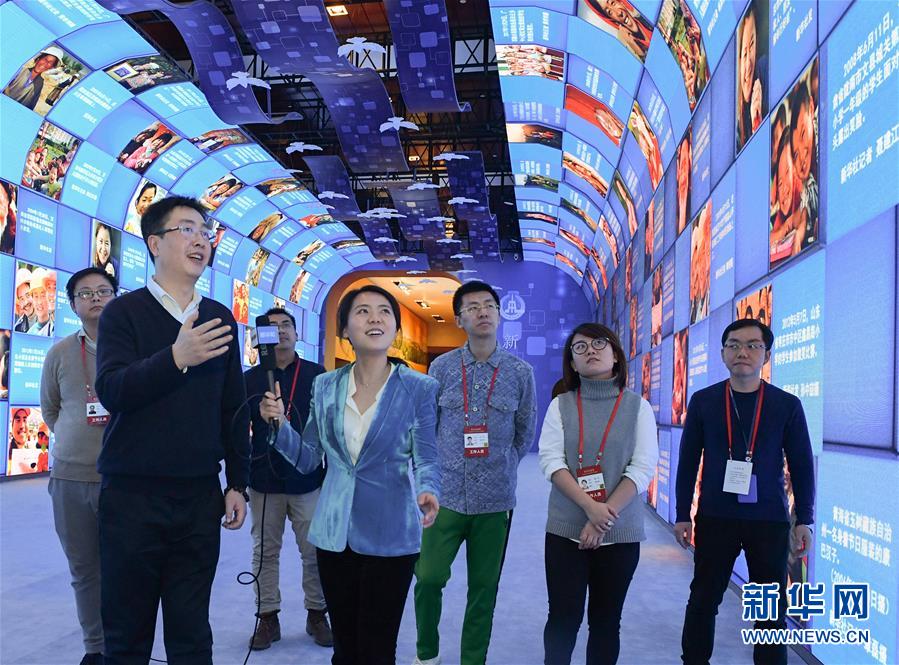 （圖文互動(dòng)）（3）筆墨書崢嶸 光影繪壯美&mdash;&mdash;慶祝改革開放40周年大型展覽新華社展項(xiàng)掃描