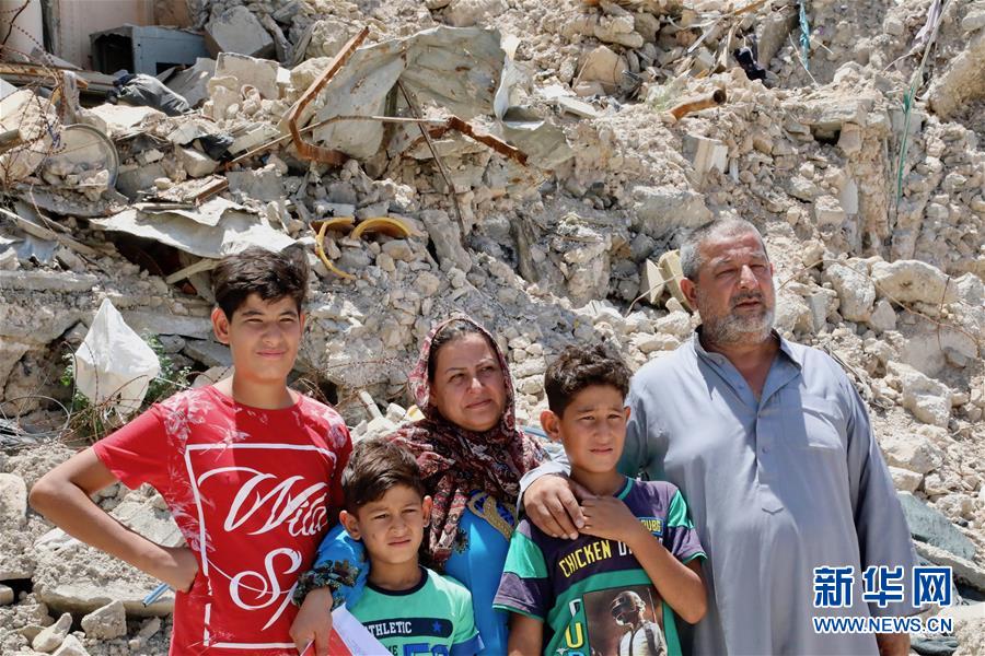 (國際·圖文互動)(1)通訊:中企員工愛心捐款助摩蘇爾老城民眾重燃生活希望