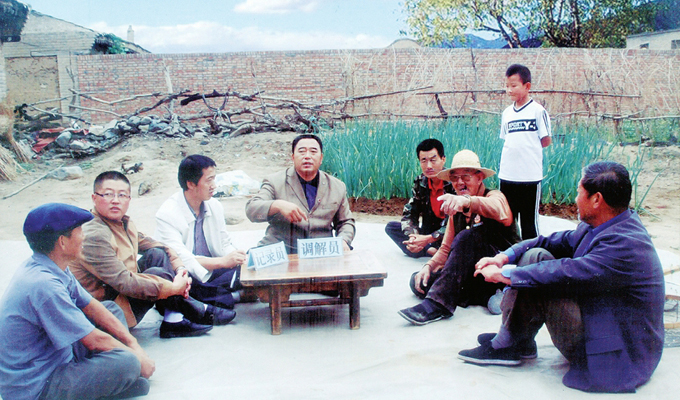 調解&ldquo;家長里短，雞毛蒜皮&rdquo;的小事情是李培斌從事的大事業(yè)