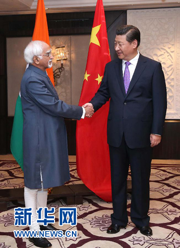 9月18日，國家主席習(xí)近平在新德里會見印度副總統(tǒng)兼聯(lián)邦院議長安薩里。 新華社記者 龐興雷 攝