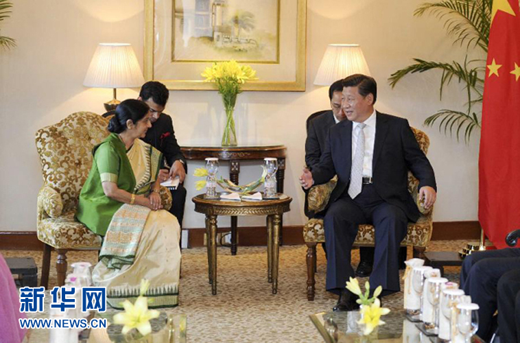 9月18日，國家主席習(xí)近平在新德里會見印度外長斯瓦拉杰。新華社記者 張鐸 攝