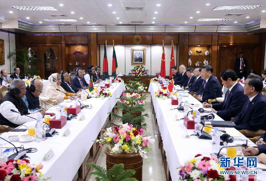 10月14日，國家主席習(xí)近平在達(dá)卡同孟加拉國總理哈西娜舉行會談。 新華社記者劉衛(wèi)兵攝 