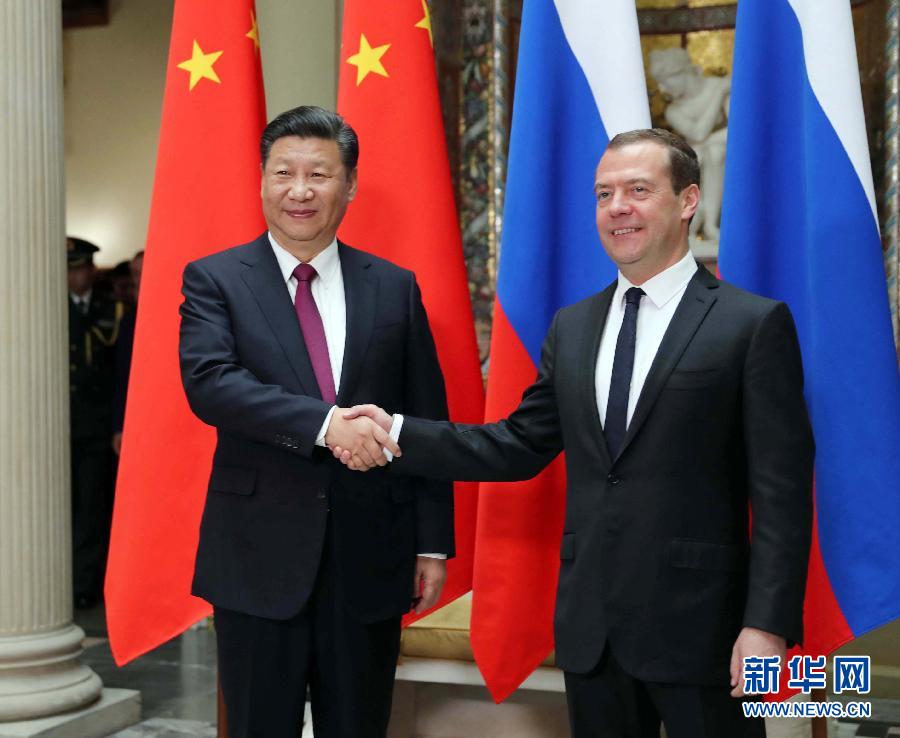 7月4日，國家主席習近平在莫斯科會見俄羅斯總理梅德韋杰夫。新華社記者 劉衛(wèi)兵 攝