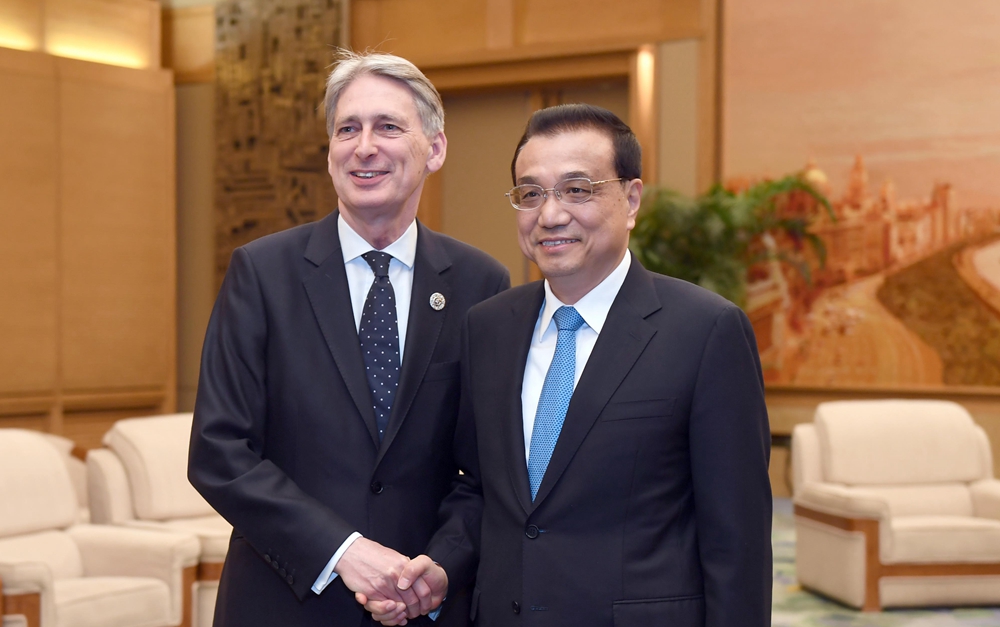 李克強(qiáng)會見英國首相特使、財政大臣哈蒙德