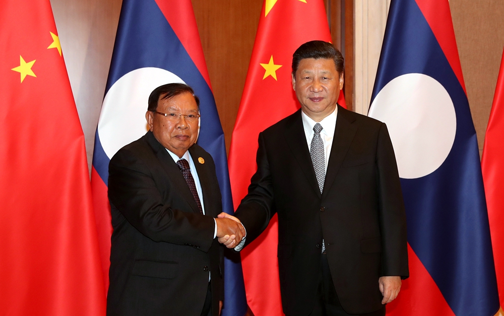 習(xí)近平同老撾人民革命黨中央總書記、國家主席本揚(yáng)舉行會談